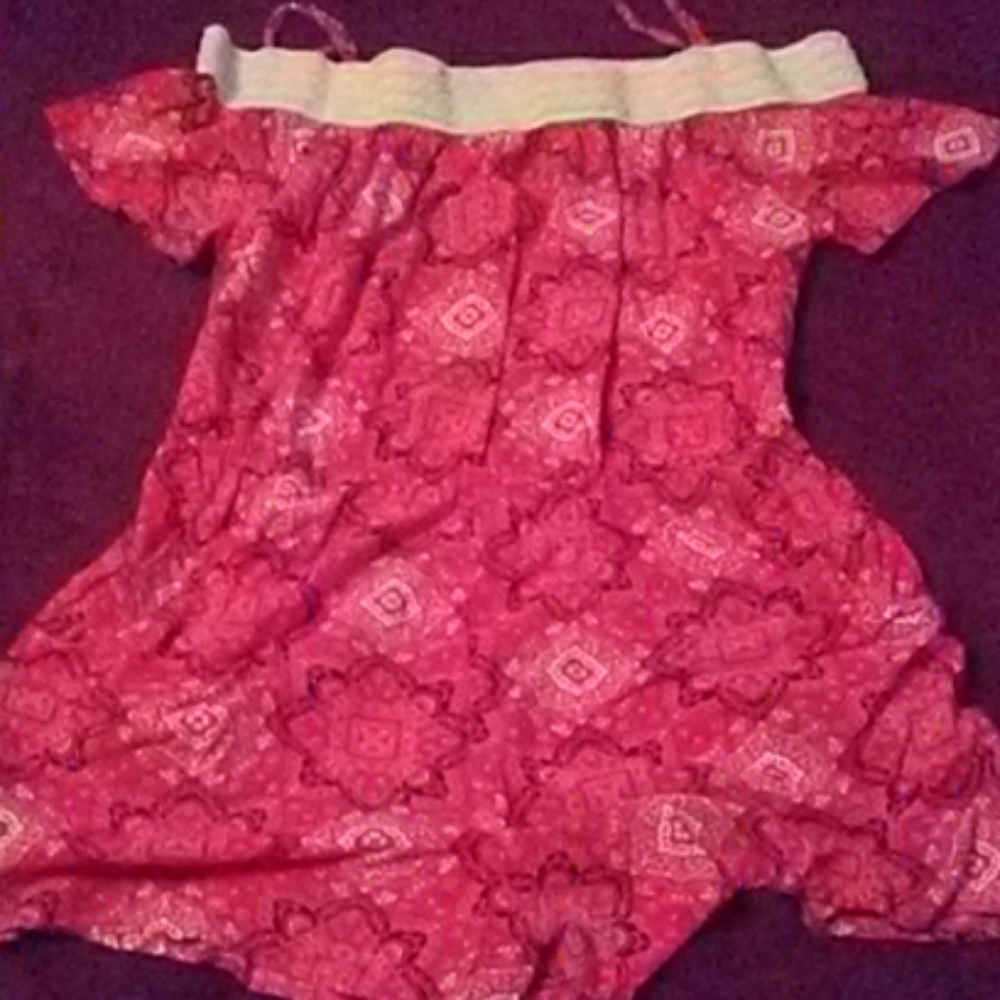 Red print off the shoulder jumper.